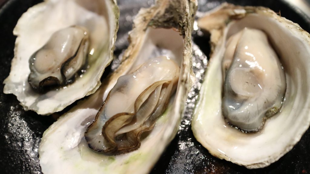 Seafood, especially oysters,  high in zinc